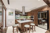 Thi công tủ bếp gỗ óc chó cao cấp căn hộ Duplex Mandarin Garden